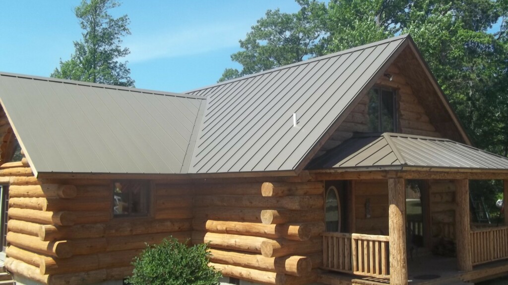 Medium Bronze metal roofing system on a log cabin