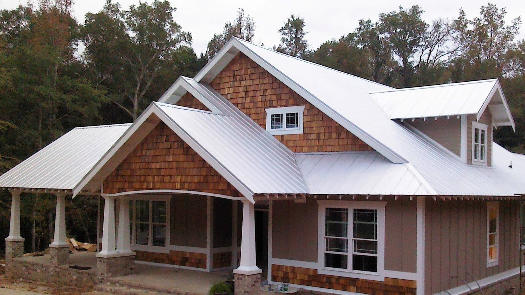 Galvalume Plus metal roofing system on a residential log property