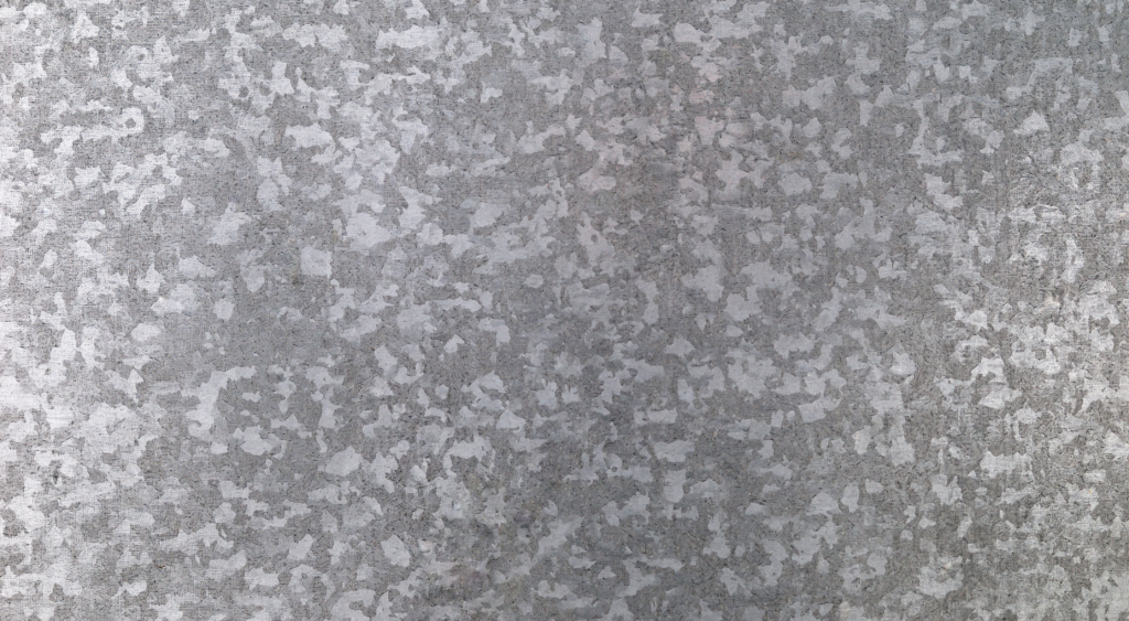 Up close view of galvanized metal to be used in metal roofing