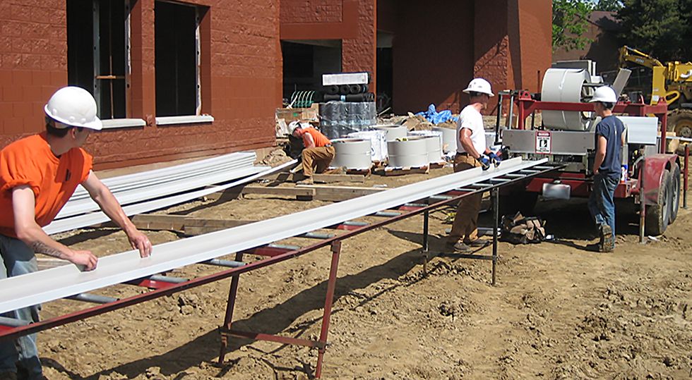 Rollforming metal roofing panels on a jobsite