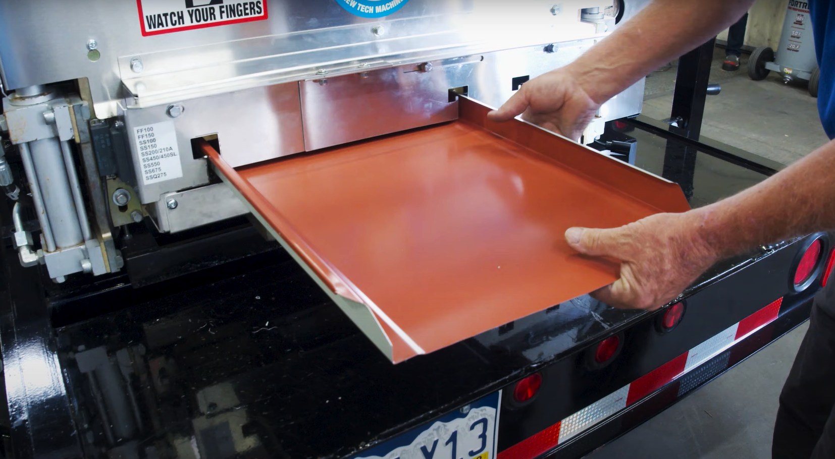 Fabricating a metal roofing panel on a rollforming machinery