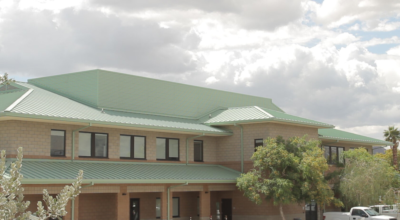 Green Metal Roofing: Pros, Cons, & Project Photos