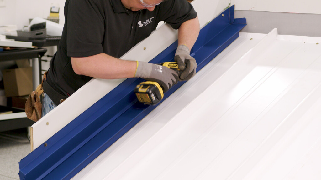 How to Install a Sidewall on a Standing Seam Roof: SMI Detail SW3
