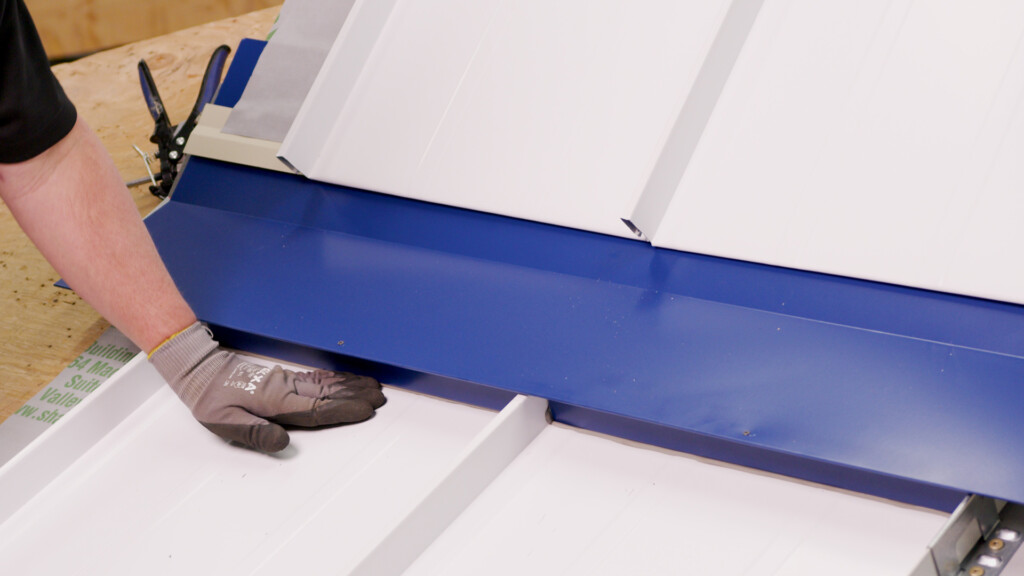 How to Install a Slope Transition on a Standing Seam Roof: SMI Detail T2
