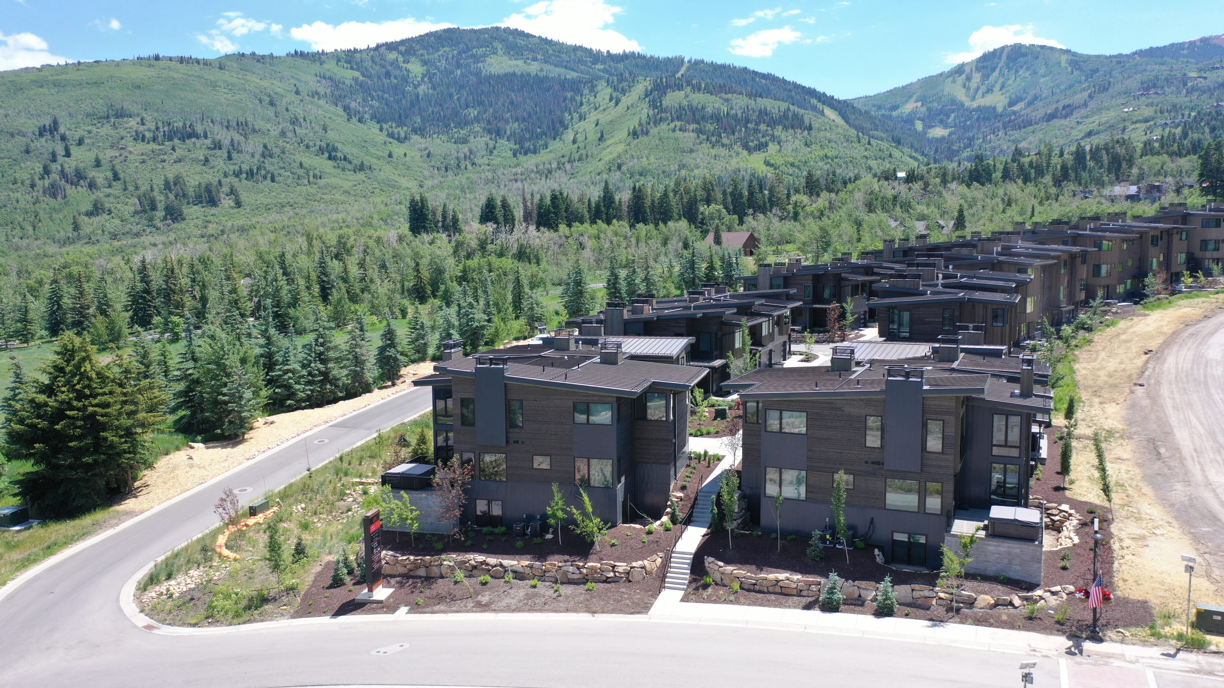 Commercial metal roofs with mountains in the background 