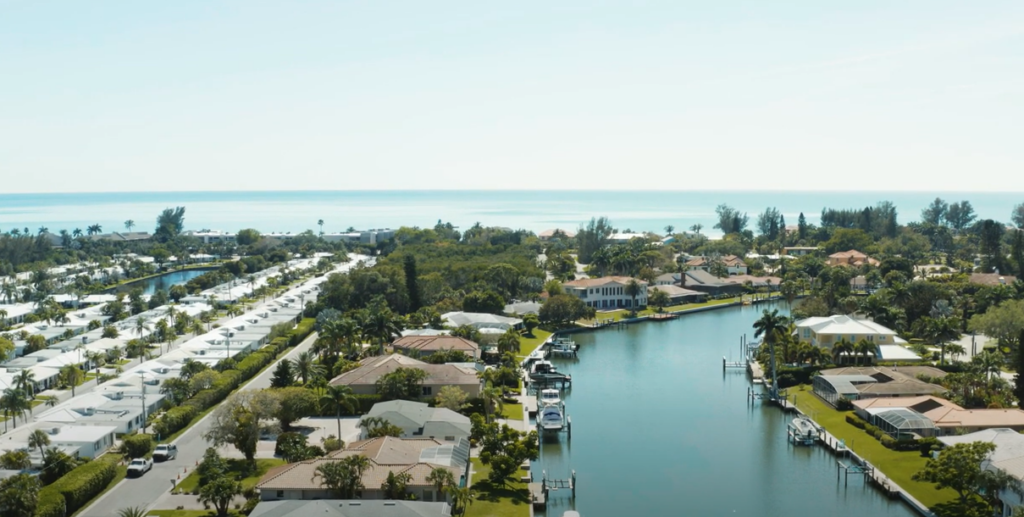 Aerial view of a residential coastal area in florida with the ocean in the background 