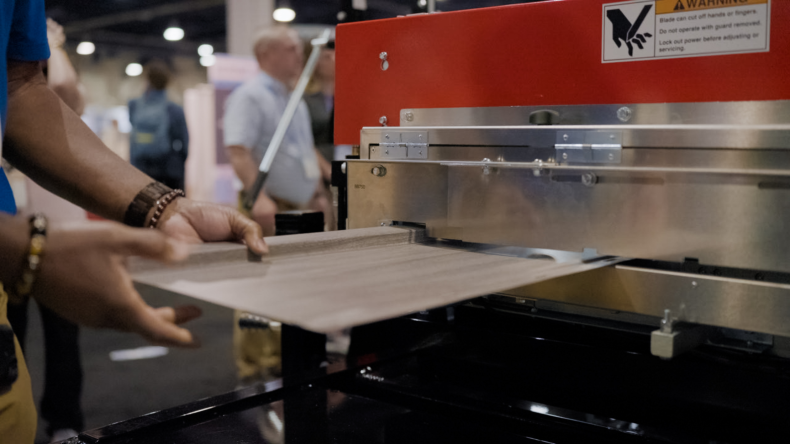 A WoodCraft panel being pulled out of a rollforming machine