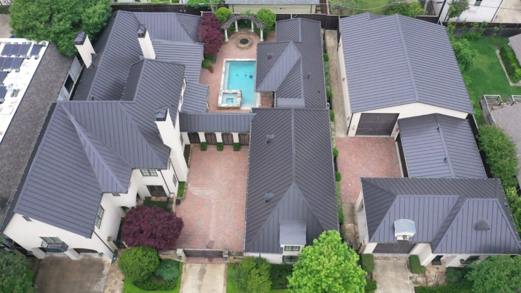 Aerial view of a standing seam metal roofing complex