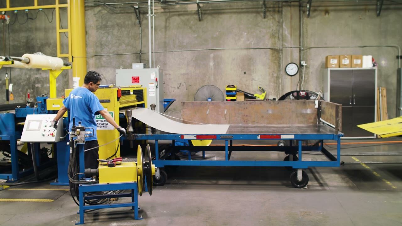A La Mirada team member processing sheet metal at the Sheffield Metals service center